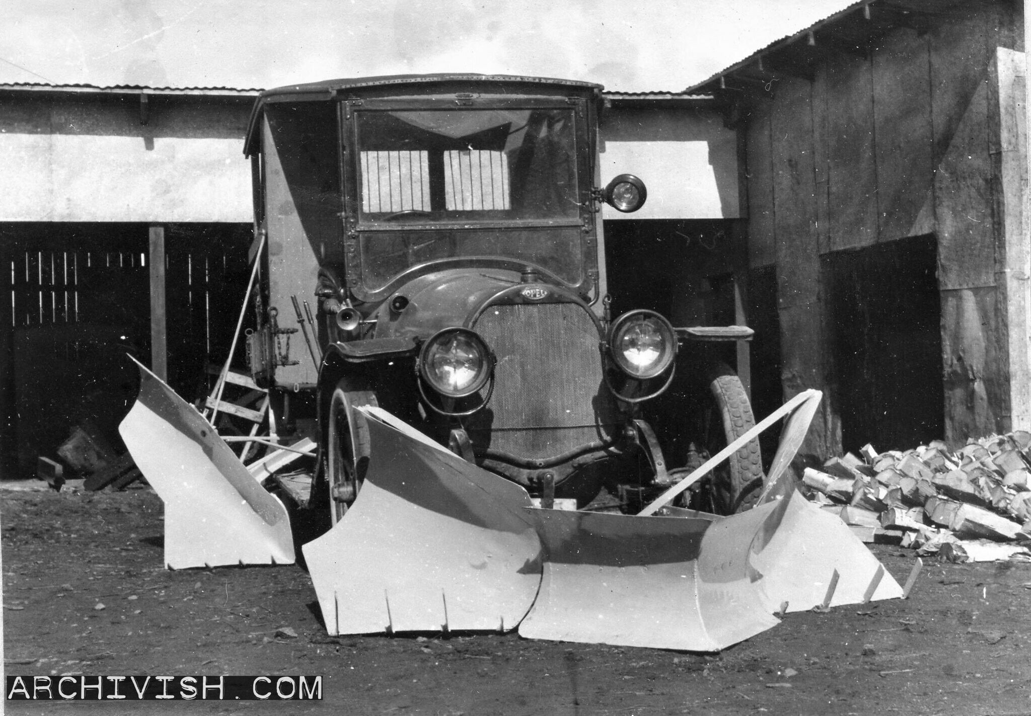 Opel with front and side mounted Øveraasen snowploughs - 1926