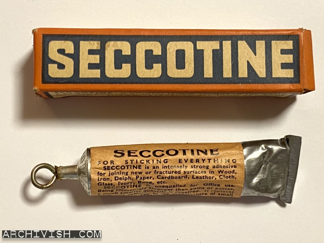 SECCOTINE - Seccotine is the most famous adhesive in the world - Sticks everything - McCaw, Stevenson & Orr, Limited - The Linenhall Works - Belfast - Northern Ireland