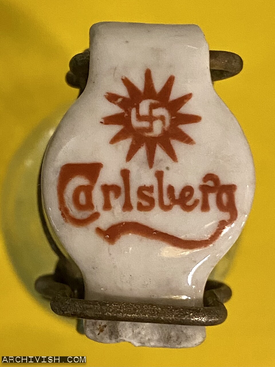 Carlsberg porcelain bottle cap with a pre-nazi swastika